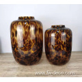 tall deep amber colored leopard spot glass vase